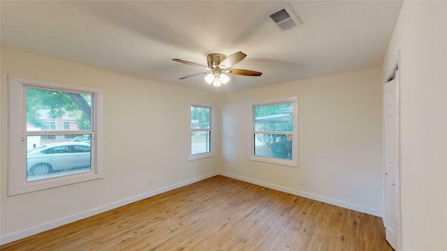 unfurnished bedroom featuring light hardwood / wood-style flooring and ceiling fan