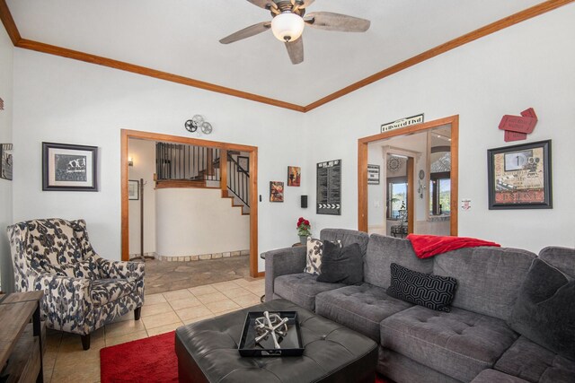 tiled living room featuring ceiling fan and crown molding