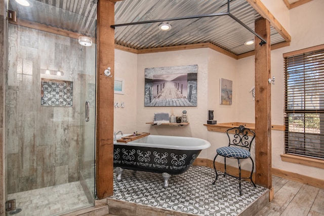 bathroom with independent shower and bath, crown molding, wood-type flooring, and wooden ceiling