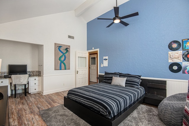 bedroom with ceiling fan, lofted ceiling with beams, and dark hardwood / wood-style floors