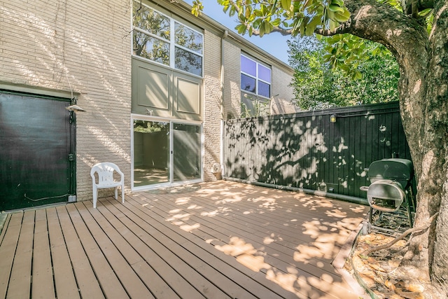 wooden terrace with grilling area