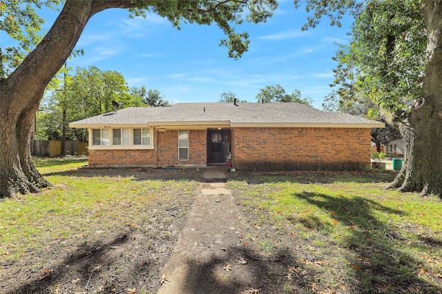 ranch-style house with a front yard