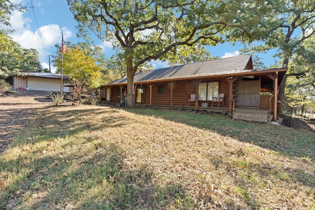 exterior space with a garage and a front yard