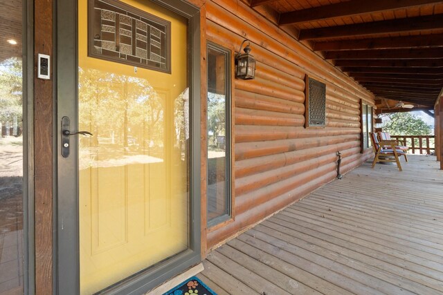 doorway to property with a porch