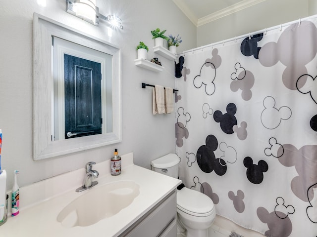 bathroom featuring toilet, walk in shower, vanity, and crown molding