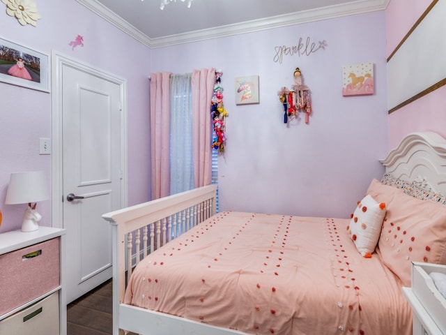 bedroom featuring dark wood-type flooring and ornamental molding