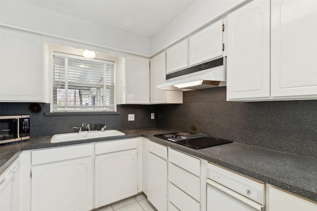 kitchen featuring dishwasher, white cabinetry, decorative backsplash, sink, and black cooktop