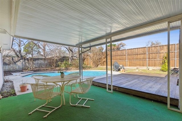 exterior space featuring a swimming pool side deck