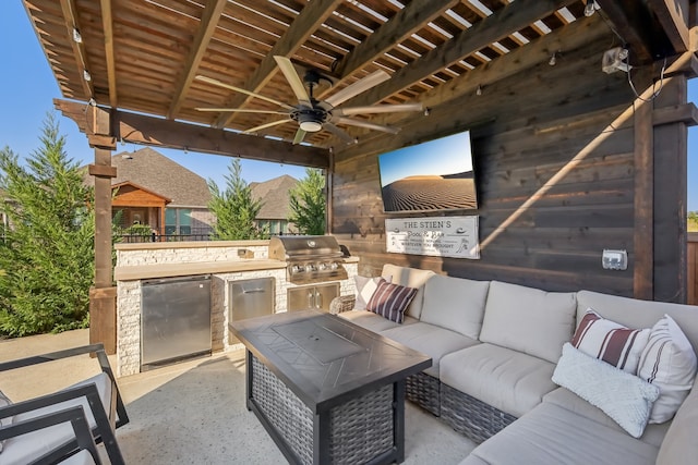 view of patio featuring a grill, area for grilling, and an outdoor living space