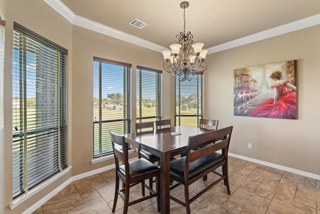 dining space with a healthy amount of sunlight, crown molding, and a chandelier