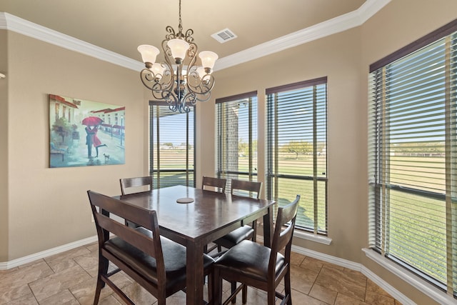 dining room featuring a chandelier, a healthy amount of sunlight, and ornamental molding