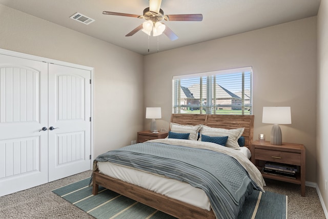 bedroom featuring carpet floors, a closet, and ceiling fan