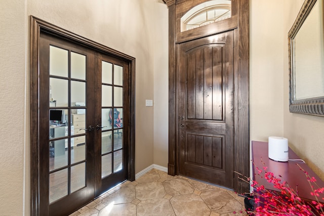 entrance foyer featuring french doors