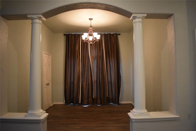 interior space with hardwood / wood-style floors and a notable chandelier