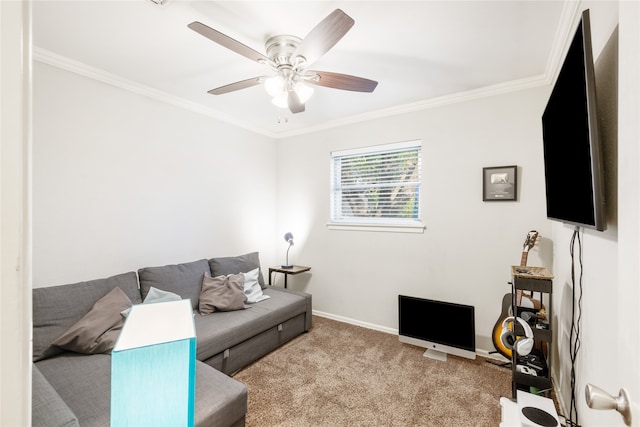 carpeted living room featuring ceiling fan and crown molding