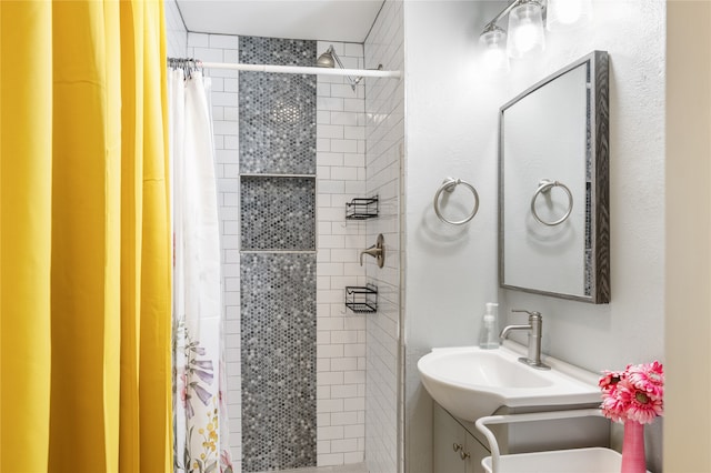 bathroom featuring walk in shower, vanity, and toilet