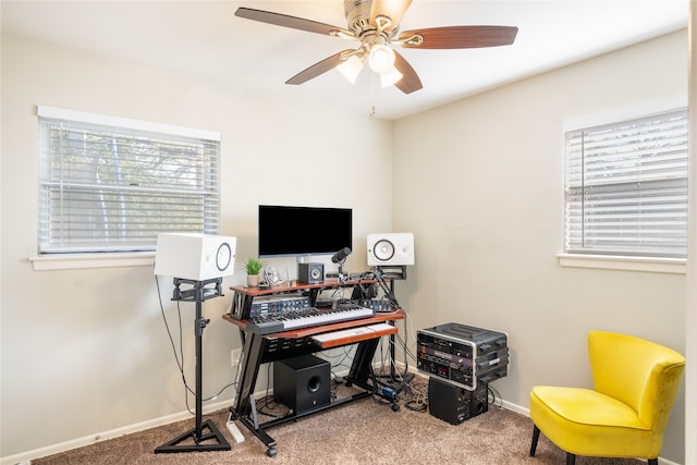 carpeted office with ceiling fan