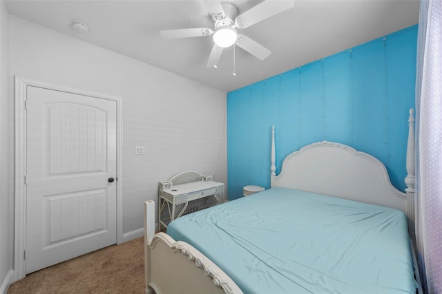 bedroom with ceiling fan and carpet