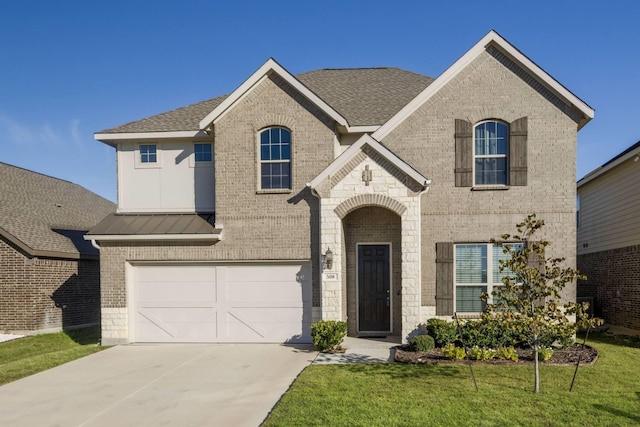 french country inspired facade featuring a front yard and a garage