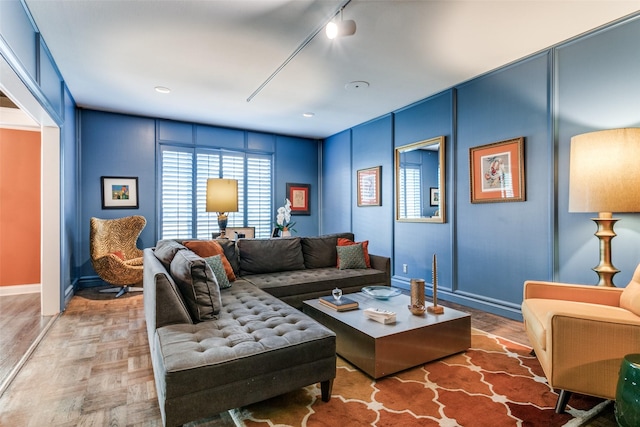 living room with parquet flooring