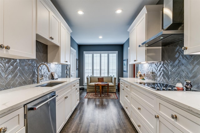 kitchen with dishwasher, white cabinetry, wall chimney range hood, sink, and black electric cooktop