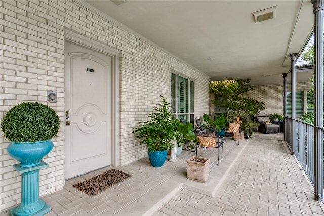 property entrance with a porch