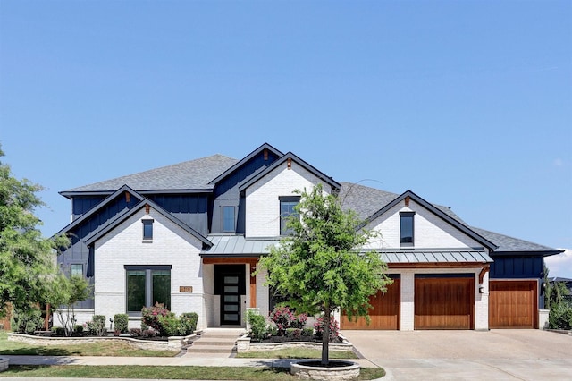 1719 Silver Marten Trl, Arlington, TX 76005 - modern farmhouse with board and batten siding, a standing seam roof, driveway, and brick siding
