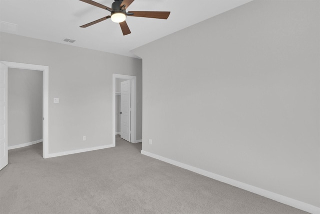 1719 Silver Marten Trl, Arlington, TX 76005 - unfurnished bedroom featuring visible vents, baseboards, a ceiling fan, and carpet floors