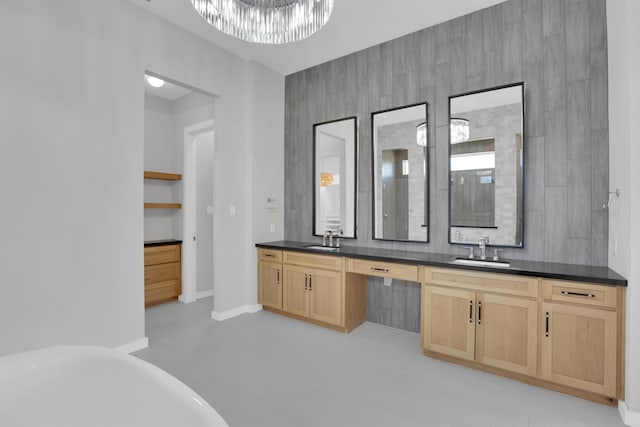 1719 Silver Marten Trl, Arlington, TX 76005 - full bath with a freestanding tub, double vanity, a sink, and finished concrete floors