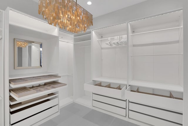 1719 Silver Marten Trl, Arlington, TX 76005 - walk in closet featuring a notable chandelier