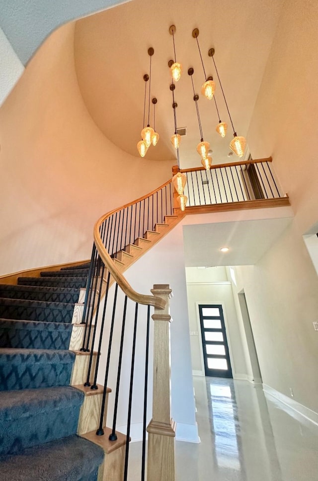 stairs with a towering ceiling