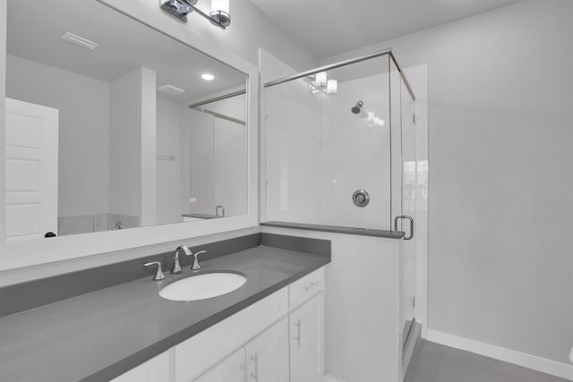 1719 Silver Marten Trl, Arlington, TX 76005 - bathroom with a shower stall, tile patterned flooring, vanity, and baseboards