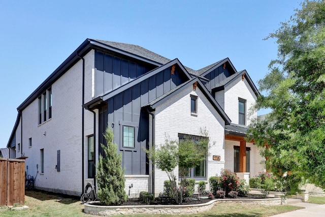 1719 Silver Marten Trl, Arlington, TX 76005 - view of front of house featuring board and batten siding and brick siding