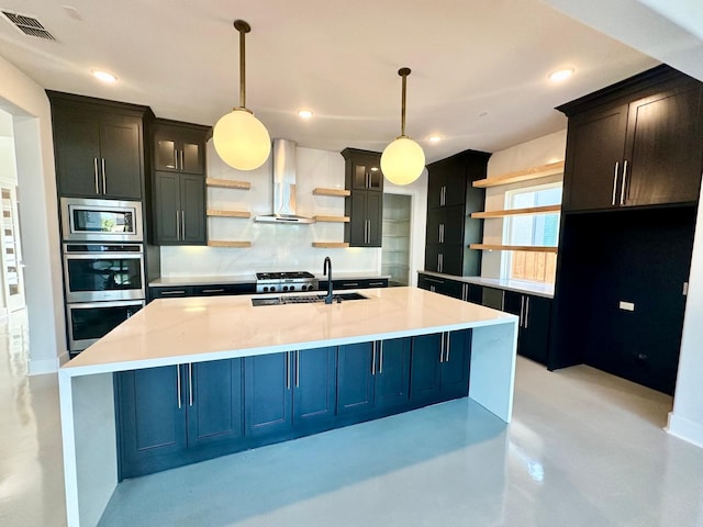 kitchen with exhaust hood, decorative light fixtures, a spacious island, and sink