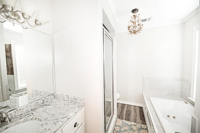 full bathroom with ornamental molding, vanity, plus walk in shower, hardwood / wood-style flooring, and toilet