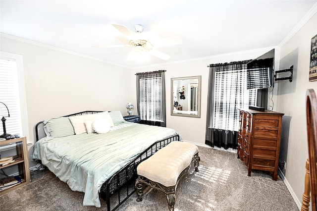 bedroom featuring ceiling fan, crown molding, and dark carpet