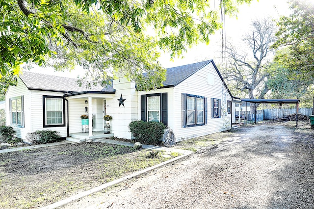 view of front of house with a carport