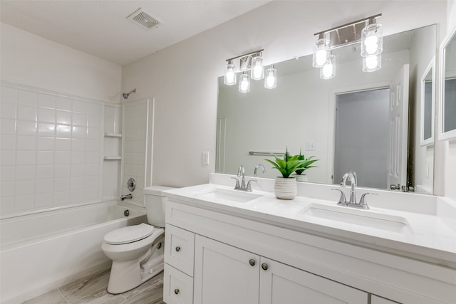 full bathroom with shower / washtub combination, toilet, and vanity