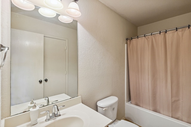 full bathroom featuring toilet, shower / bath combo, and vanity