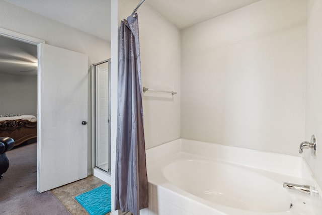 bathroom featuring shower with separate bathtub and tile patterned floors