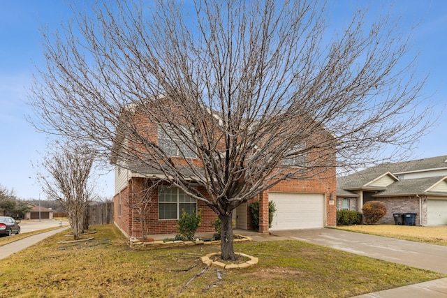 view of front of home featuring a front yard and a garage