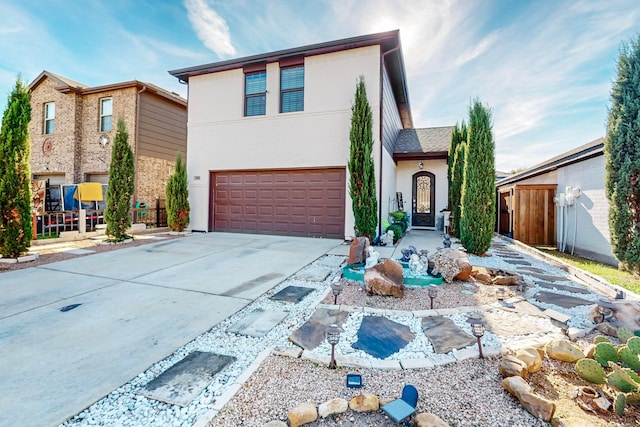 view of front of property with a garage