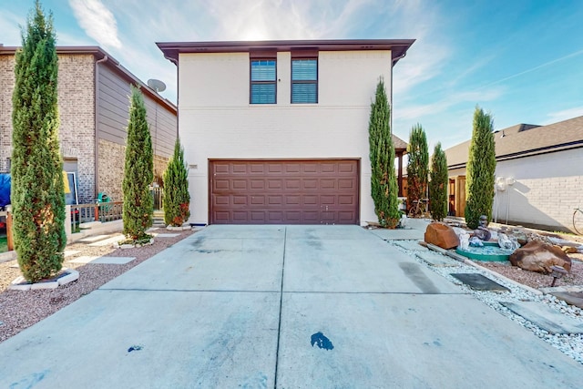 front facade with a garage