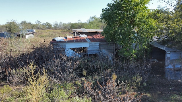 view of entry to storm shelter