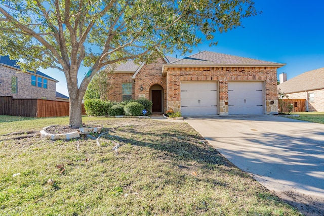 view of front of property with a front lawn