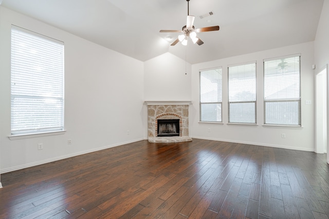 unfurnished living room with dark hardwood / wood-style floors, a healthy amount of sunlight, and ceiling fan