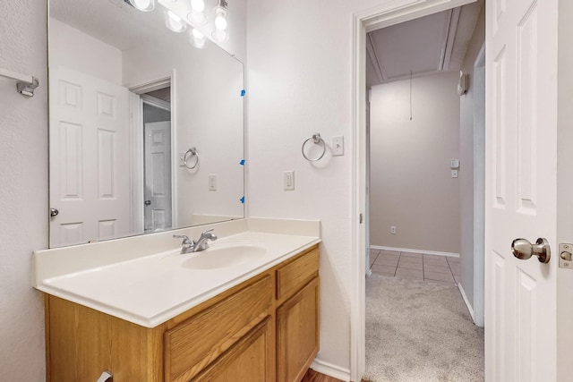 bathroom featuring tile patterned floors and vanity