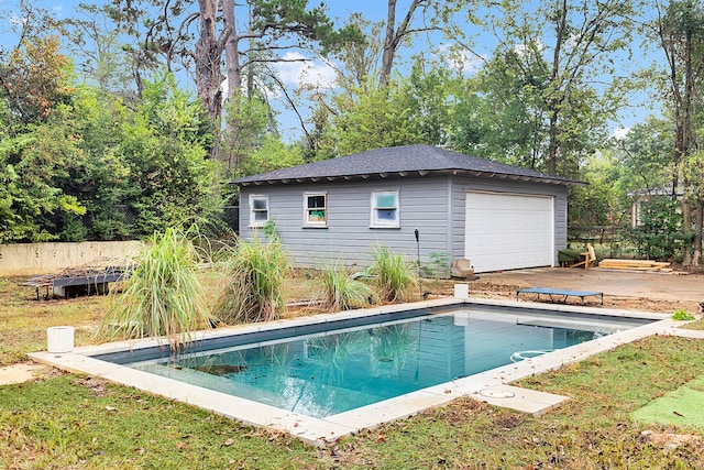 rear view of house featuring a fenced in pool and a sunroom