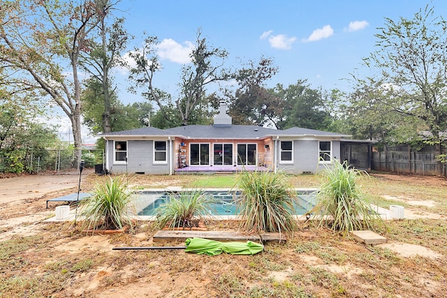 view of pool with a storage unit