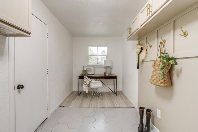 interior space with light tile patterned floors